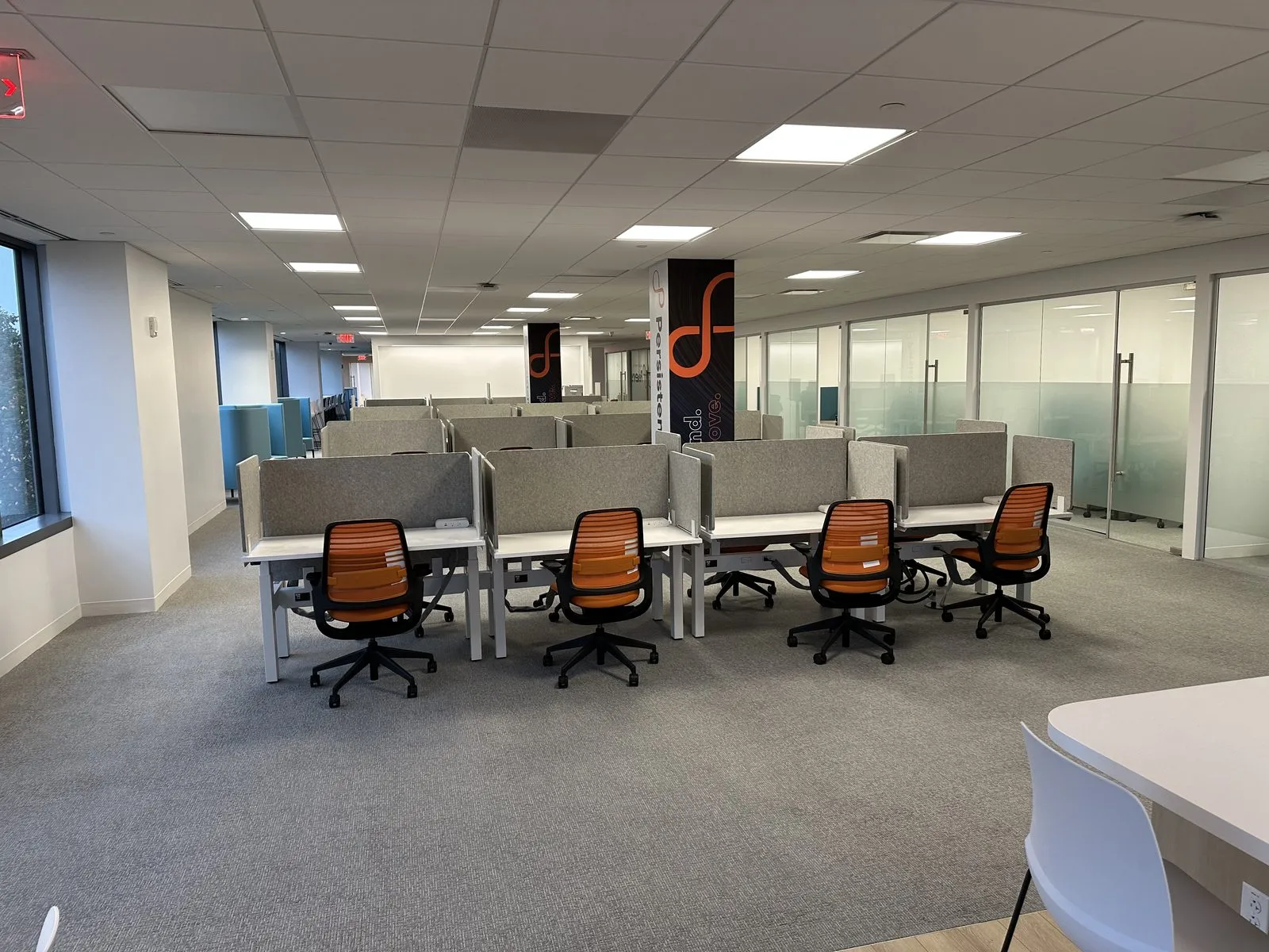 Open office buildout with workstation AV and network drops at each desk